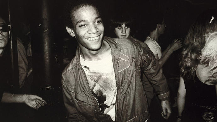 Photo of Jean Michel Basquiat dancing in the Mudd Club