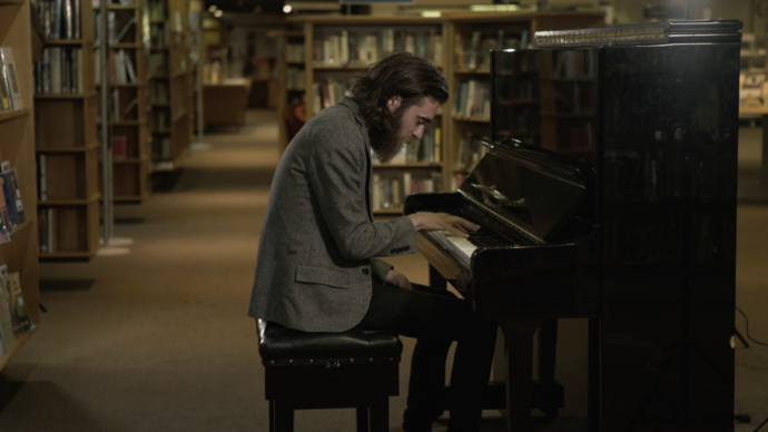 keaton henson playing the piano in our library