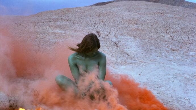 Judy Chicago, Immolation from Women and Smoke, 1972 Fireworks performance Performed by Faith Wilding in the California Desert © Judy Chicago/Artists Rights Society (ARS), New York Photo courtesy of Through the Flower Archives Courtesy of the artist; Salon 94, New York; and Jessica Silverman Gallery, San Francisco