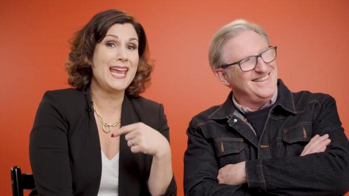 Stephanie J Block and Adrian Dunbar talk and laugh with each other.