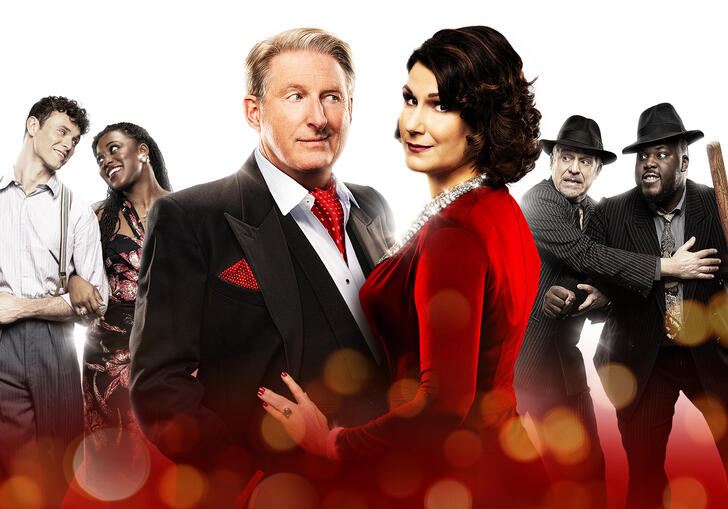 The lead six members of the Kiss Me Kate cast, including Adrian Dunbar and Stephanie J Block, pose for the camera.