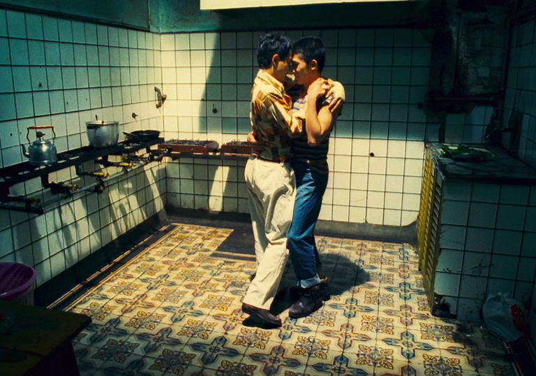 Photo of two men embracing from Wong Kar Wai's Happy Together
