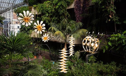 sculptures hang in the Conservatory
