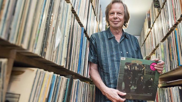 photo of  Joe Boyd holding a record