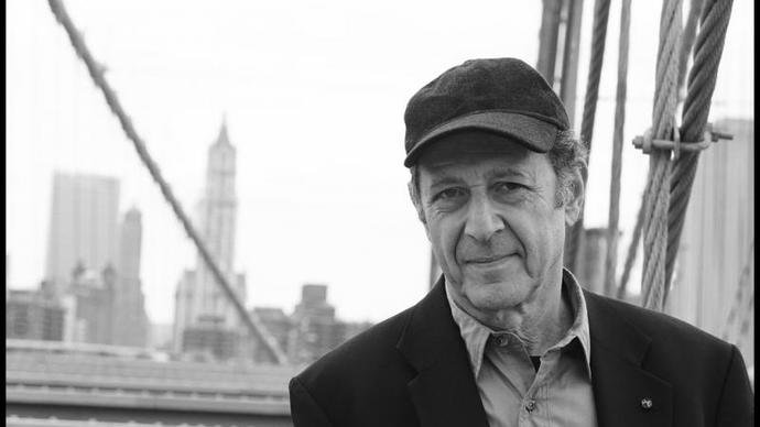 a black and white photo of steve reich