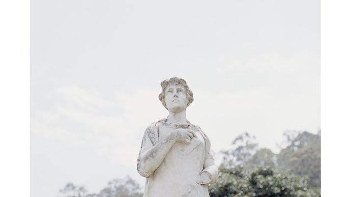 album cover of susanne's latest album featuring a greek statue in a garden