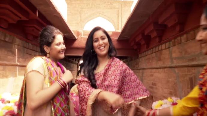 photo of two women in Punjabi suits