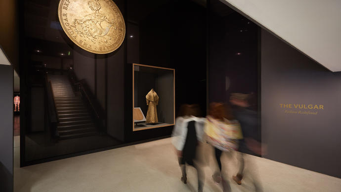 Visitors entering The Vulgar exhibition at the Barbican