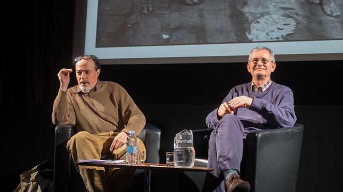 Photo of Bruce Gilden and Martin Parr on stage