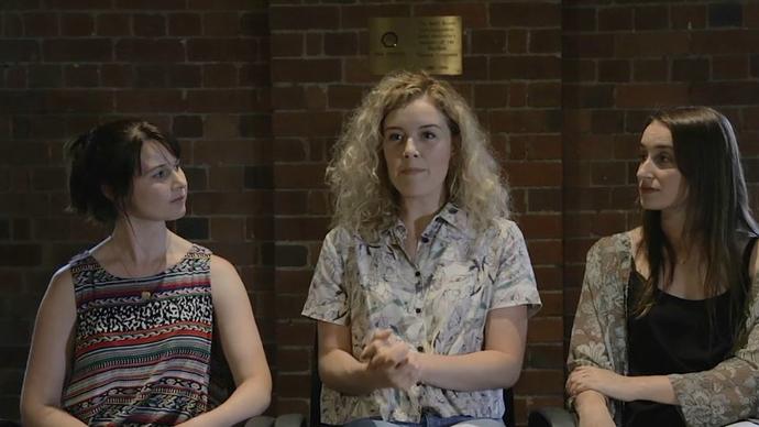 photo of three women being interviewed