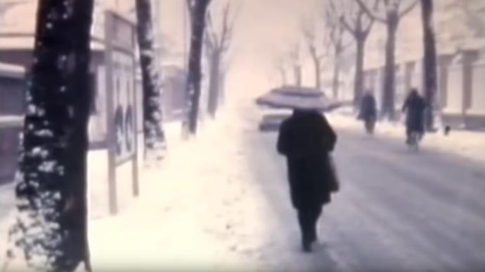 person walking in the snow