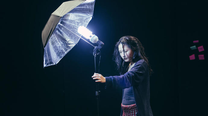 actress holding lamp