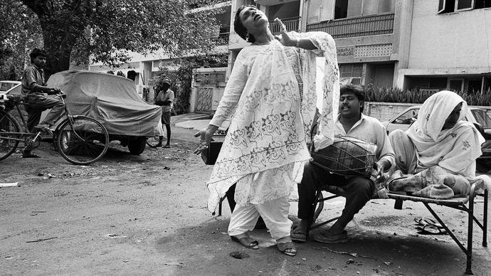 Photo of woman dancing in the street