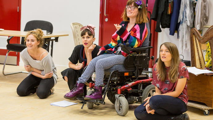 A group of people watching performers