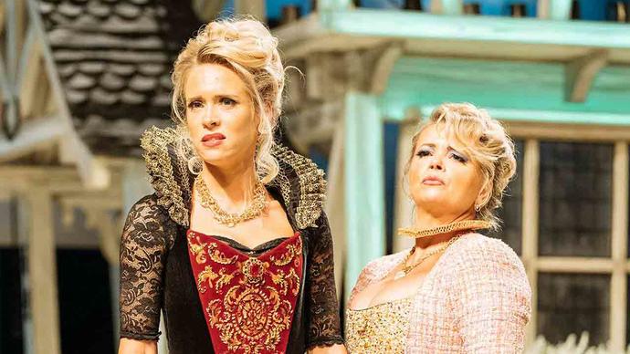 photo of two blonde actress dressed as merry wives of windsor