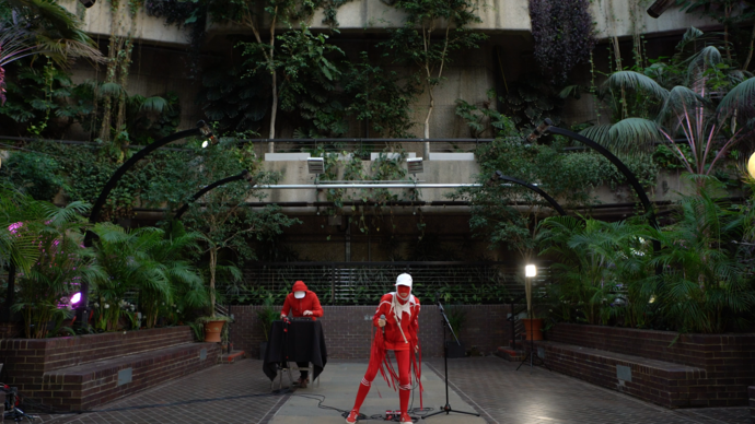 gazelle twin performing in the barbican conservatory