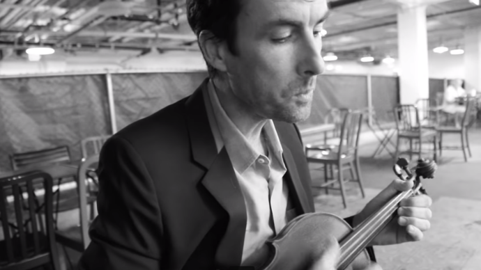 andrew bird playing guitar