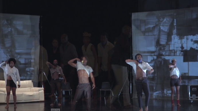 dancers on stage taking shirt off