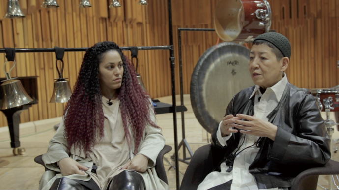 photo of midori takada and lafawndah playing music