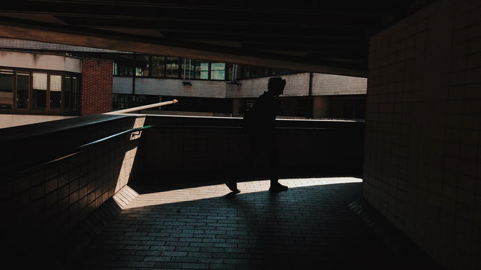 some man in the shadow at the barbican