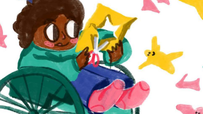 illustration of a young girl in a wheelchair cutting out shapes from a piece of paper