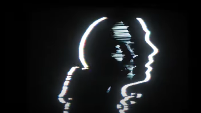 Photo of led lights in the shape of a man with a black background 