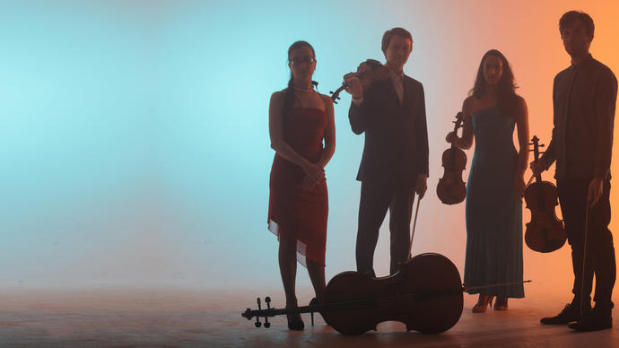 The shadows figures of the Ligeti Quartet and their instruments are on the right hand side of the image, with the background gradient moving from blue on the left to orange on the right