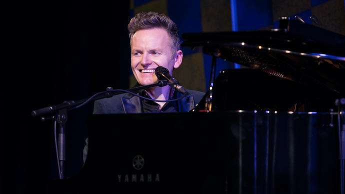 a photo of Joe Stillgoe performing at the piano