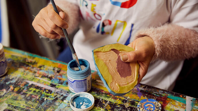 a colour photo of a person making art