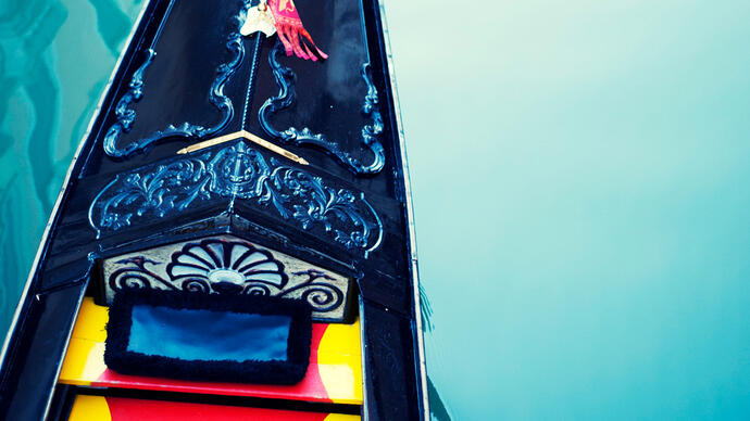 Close up photo of a gondola on the water