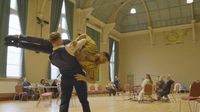 The company rehearse in the Lay Down Your Burdens rehearsal room. 