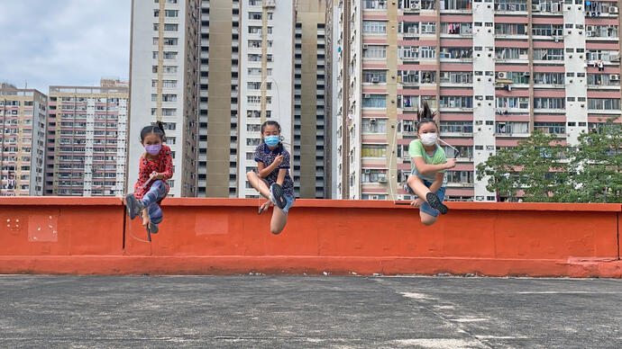 image of children playing jump rope