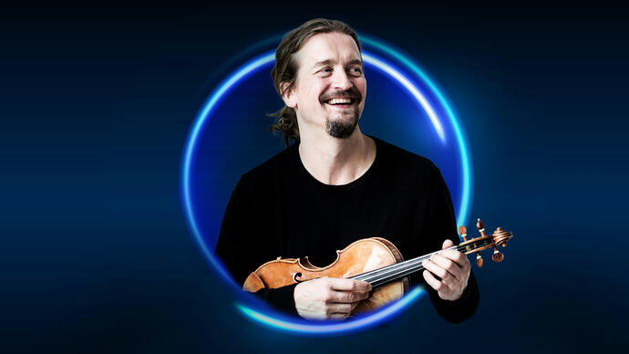 n image of Christian Tetzaff surrounded by a blue circle against a blue background