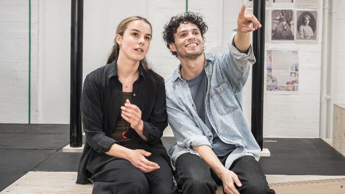 Wendy and Peter Pan sit side-by-side in the rehearsal room