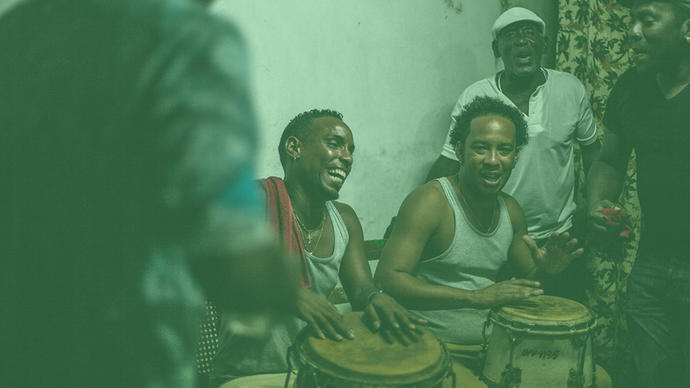 a group of men playing cuban music somewhere in cuba