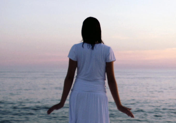 A woman looking out to sea