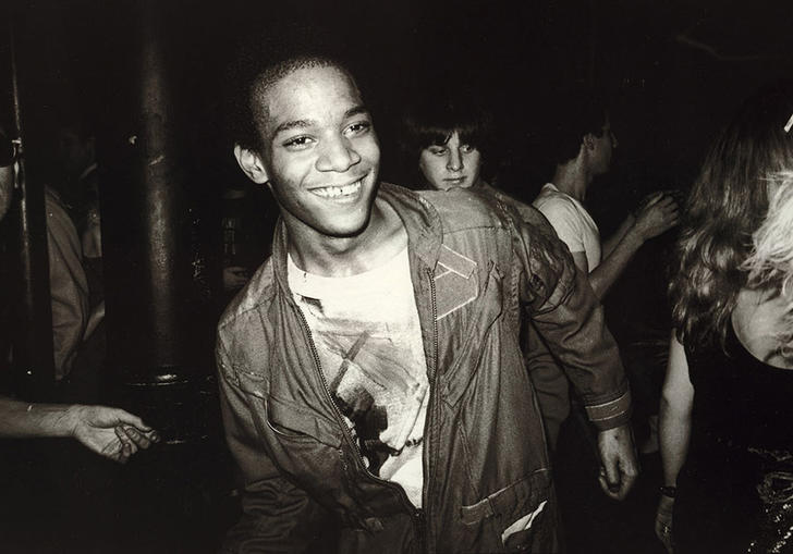 Photo of Jean Michel Basquiat dancing in the Mudd Club
