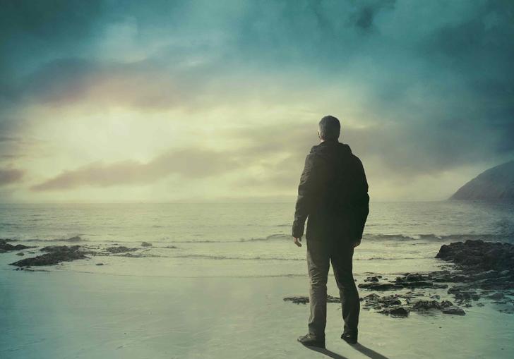 photo of a man staring into the distance