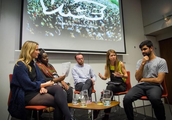 Photo of group of young people in a panel discussion