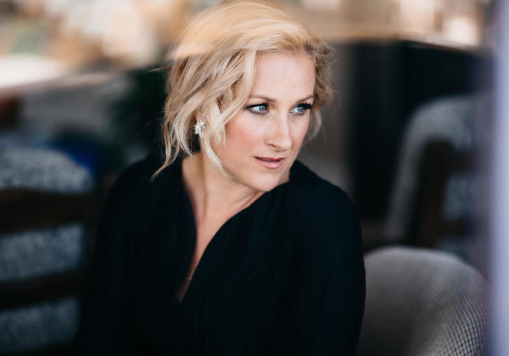 Diana Damrau looking out a window