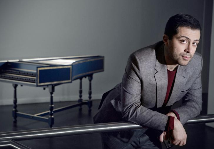Mahan Esfahani leaning near hapsichord