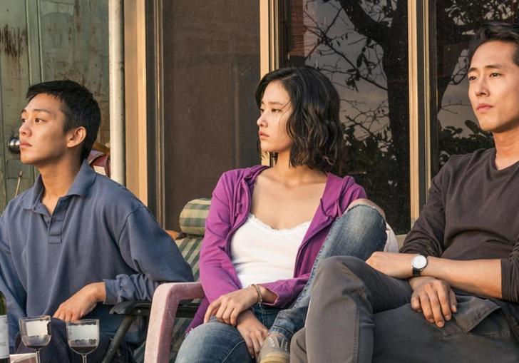 Image of three people sitting on a patio