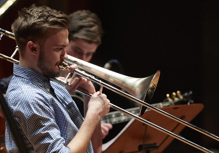 Guildhall Jazz Orchestra musician playing the trombone