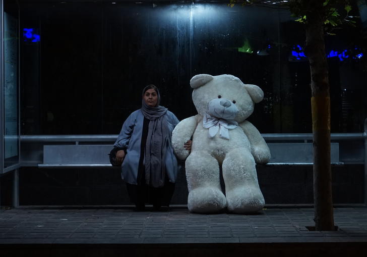 Woman at bus stop