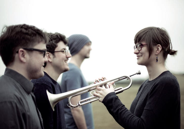 dinosaur band, Laura Jurd holding trumpet