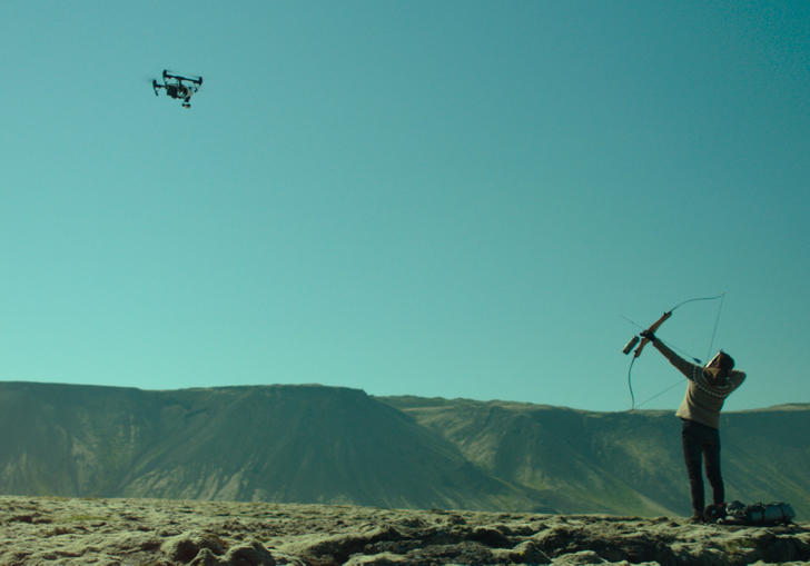 Woman At War's protagonist aims her crossbow at a drone