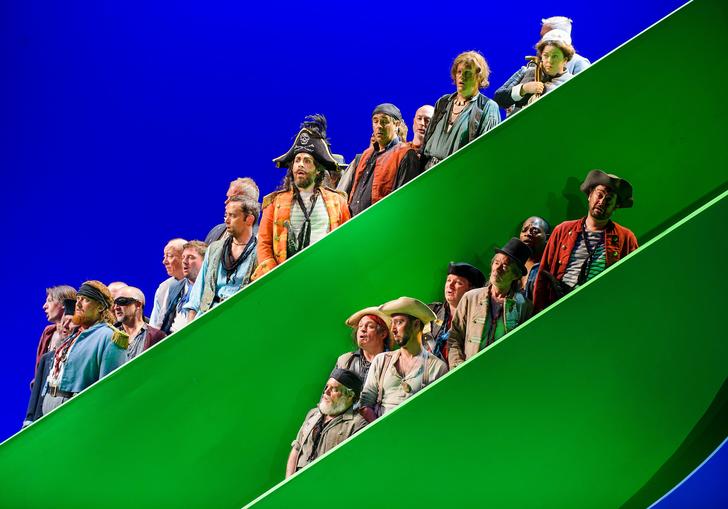 Pirates in green rafters against a sky blue background