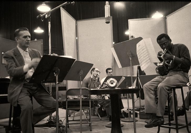 Miles Davis playing trumpet in the studio
