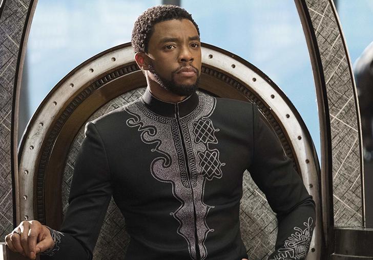 Chadwick Boseman sitting on the throne in Wakanda