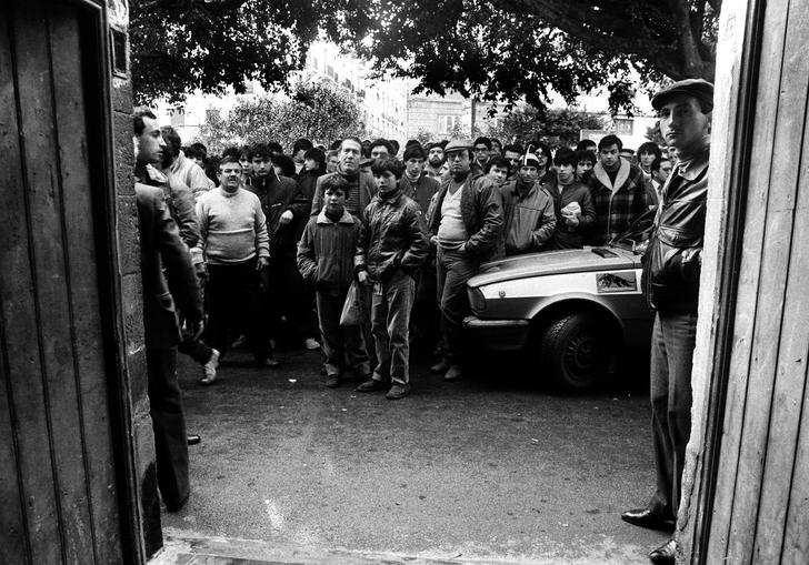 group of men standing in dorrway